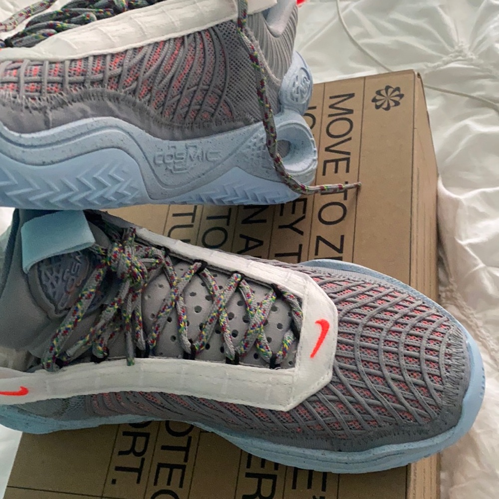 NIKE COSMIC UNITY. NEVER BEEN WORN